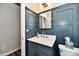 View of half bathroom with shiplap accent and marble countertop at 17390 Tribute Row, Noblesville, IN 46060
