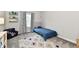 Cozy bedroom featuring a single bed, stylish decor, and soft carpet for a comfortable and inviting space at 17390 Tribute Row, Noblesville, IN 46060