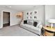 Inviting living room with a comfortable sofa and decorative accents at 17390 Tribute Row, Noblesville, IN 46060