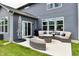 View of patio area with outdoor seating and BBQ at 17390 Tribute Row, Noblesville, IN 46060