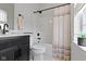 Bathroom features a modern vanity with black hardware and a shower-tub combo at 1892 Ponsonby Dr, Westfield, IN 46074