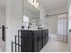 Bathroom features a modern vanity with black hardware and a shower-tub combo at 1892 Ponsonby Dr, Westfield, IN 46074