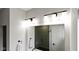 Well-lit bathroom featuring a glass-enclosed shower, vanity, and fixtures at 1892 Ponsonby Dr, Westfield, IN 46074
