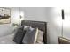 Stylish bedroom highlighting bed with elegant headboard, modern pillows, and designer lighting fixtures at 1892 Ponsonby Dr, Westfield, IN 46074