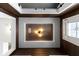 Unique ceiling with recessed lighting, textured wallpaper, and decorative light fixture at 1892 Ponsonby Dr, Westfield, IN 46074