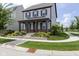 Charming two-story home with front porch, landscaping, and traditional architectural details at 1892 Ponsonby Dr, Westfield, IN 46074