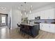 Well-lit kitchen with island, stainless steel appliances, and breakfast bar at 1892 Ponsonby Dr, Westfield, IN 46074