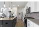 Bright kitchen featuring stainless steel appliances and eat-in island at 1892 Ponsonby Dr, Westfield, IN 46074