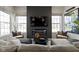 Cozy living room with fireplace, TV, and comfortable seating at 1892 Ponsonby Dr, Westfield, IN 46074