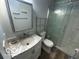 Bathroom with a glass shower and marble countertop vanity at 1919 Manor Dr, Lebanon, IN 46052