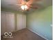 Bedroom with carpeted floors and a standard closet at 1919 Manor Dr, Lebanon, IN 46052