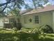View of the front yard, shuttered windows and a decorative star at 1919 Manor Dr, Lebanon, IN 46052