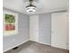 Bedroom features light gray walls, two closets, plush carpet, and a window at 217 W Burnside Ave, Fairland, IN 46126