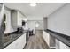 Modern kitchen with sleek countertops, stainless appliances, and open layout for easy entertaining and cooking at 217 W Burnside Ave, Fairland, IN 46126
