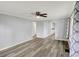 Spacious living room featuring sleek, modern flooring and ample natural light for a bright and airy feel at 217 W Burnside Ave, Fairland, IN 46126