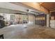 Spacious garage with concrete floors, natural light and large garage door at 2421 W 39Th St, Indianapolis, IN 46228