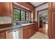 Well-appointed kitchen with stainless steel appliances and wooden cabinets at 2421 W 39Th St, Indianapolis, IN 46228