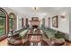 Elegant living room featuring a fireplace, hardwood floors, and large windows with beautiful natural light at 2421 W 39Th St, Indianapolis, IN 46228