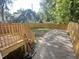 Large fenced backyard with freshly graveled parking pad and new deck stairs at 2423 E 13Th St, Indianapolis, IN 46201