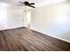 A minimalist bedroom with neutral walls, modern flooring, and a large closet at 2423 E 13Th St, Indianapolis, IN 46201