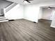 Spacious living room with sleek, gray flooring and a contemporary open layout at 2423 E 13Th St, Indianapolis, IN 46201