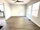 Open-concept living area with plenty of natural light and sleek flooring, perfect for entertaining at 2423 E 13Th St, Indianapolis, IN 46201