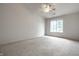 Comfortable bedroom featuring a bright window and ceiling fan at 246 Legends Creek Way # Apt 207, Indianapolis, IN 46229