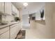 Modern kitchen area featuring sleek appliances and easy access to the dining or living area at 246 Legends Creek Way # Apt 207, Indianapolis, IN 46229