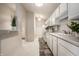 Efficient kitchen design with white cabinets, modern appliances, and ample counter space for cooking at 246 Legends Creek Way # Apt 207, Indianapolis, IN 46229