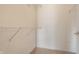 Spacious walk-in closet featuring wire shelving providing ample storage space for any wardrobe at 246 Legends Creek Way # Apt 207, Indianapolis, IN 46229