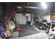 Garage with storage, tools, boxes, and a blue basketball hoop at 2638 S Mcclure St, Indianapolis, IN 46241