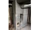 Close-up shot of the furnace, featuring metal ducts and showing signs of wear and tear at 2742 Allen Ave, Indianapolis, IN 46203
