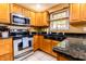 Modern kitchen featuring stainless steel appliances and ample counter space at 2756 Bluebell E Ct, Columbus, IN 47201