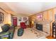 Inviting living room featuring a stone fireplace and comfortable furnishings at 2808 Woodside Dr, Plainfield, IN 46168