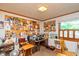 Home office space with a large bulletin board wall, desk, and lots of natural light from the window at 2808 Woodside Dr, Plainfield, IN 46168