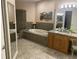Bathroom features a large tub, granite countertops, walk in shower, and tile flooring at 3154 Beach Blvd, Cicero, IN 46034