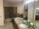 Bathroom features a large tub, walk in shower, granite countertops, and double sinks at 3154 Beach Blvd, Cicero, IN 46034
