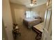 Cozy bedroom with two beds, soft lighting, and a window, perfect for relaxation at 3154 Beach Blvd, Cicero, IN 46034