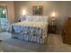 Bedroom with a comfy bed, sitting area, and a view of the trees from the window at 3154 Beach Blvd, Cicero, IN 46034