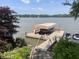 Lake view of covered boat lift and personal watercraft at 3154 Beach Blvd, Cicero, IN 46034