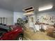 View of the spacious garage with high ceilings and built in storage at 3154 Beach Blvd, Cicero, IN 46034
