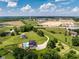 The property features lush greenery, a pool, and a long private driveway at 320 Briar Hill Dr, Whiteland, IN 46184