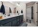 Stylish bathroom with double vanity, modern fixtures, and a separate shower and tub at 320 Briar Hill Dr, Whiteland, IN 46184