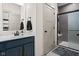 Well-lit bathroom with stylish vanity, walk-in shower, and modern fixtures at 320 Briar Hill Dr, Whiteland, IN 46184