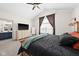 Relaxing bedroom featuring a comfortable bed, a dresser, and a calming color scheme at 320 Briar Hill Dr, Whiteland, IN 46184