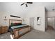 Inviting bedroom featuring a vaulted ceiling, soft lighting, and stylish decor elements at 320 Briar Hill Dr, Whiteland, IN 46184