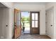 Open view through the foyer, showcasing the home's bright interior and inviting atmosphere at 320 Briar Hill Dr, Whiteland, IN 46184