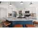 Spacious kitchen features a granite island with seating, stainless appliances, and modern cabinetry at 320 Briar Hill Dr, Whiteland, IN 46184