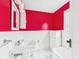 Updated red and white bathroom featuring classic fixtures and tub at 328 Marine Dr, Anderson, IN 46016