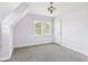 Bedroom with lavender walls, carpet, window with blinds and access door at 328 Marine Dr, Anderson, IN 46016